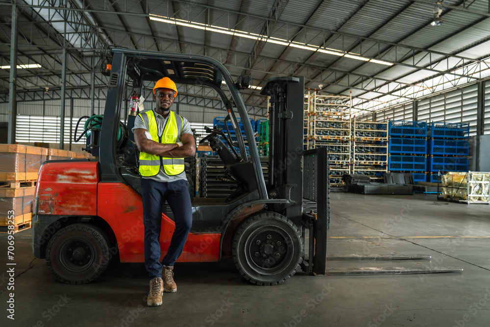 African American males smile at workers as forklift drivers are happy working in industry factory logistics ships. Woman forklift driver in the warehouse area.