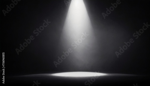 Empty studio with a beam of light on black paper background. Minimalist mockup  podium display and showcase  studio room  Desk illuminated by spotlight  interior room for displaying products