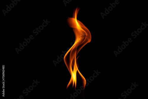 Hot flames on a black background. Beautiful flame of fire in the dark. Abstract of burning flames and smoke. © scentrio