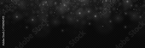 White light of dust. Bokeh light effect background. Christmas background made of shining dust and glare. Glowing light bokeh confetti on transparent background.