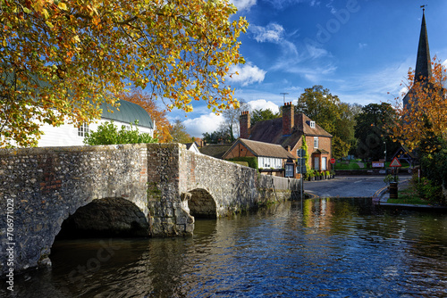 Eynsford a Village in Kent near Sevenoaks with a stone medieval bridge and Church and a ford through the shallow river for larger vehicles to cross.