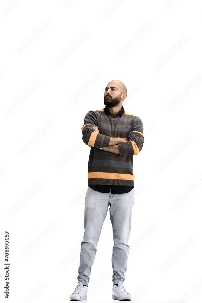 A man, on a white background, in full height, crossed his arms A man, on a white background, in full height, crossed his arms
