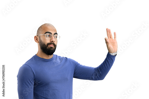 A man, on a white background, in close-up, shows an ok sign