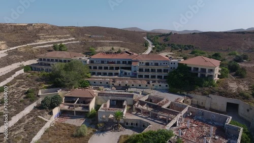 Ruins Of The Kaviria Abandoned Hotel In The Ghost Town Of Limnos, Greece. Aerial Drone Shot photo