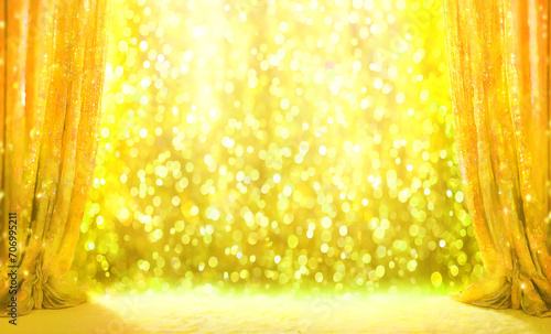 光がキラめく華やかなゴールドイエローカラーのカーテンを使った背景 photo