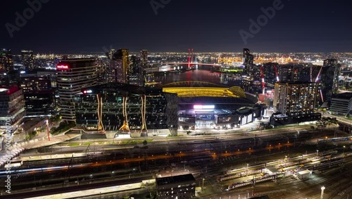 Night Timelapse from the Balcony of a skyscraper apartment overlooking the beautiful skyline behind Melbourne's Marvel Stadium photo