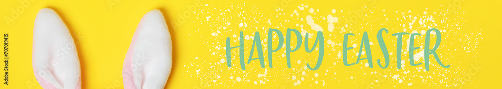 Easter greeting card with Plushy bunny ears on bright background. Easter minimal concept Easter greeting card with Plushy bunny ears on bright background. Easter minimal concept