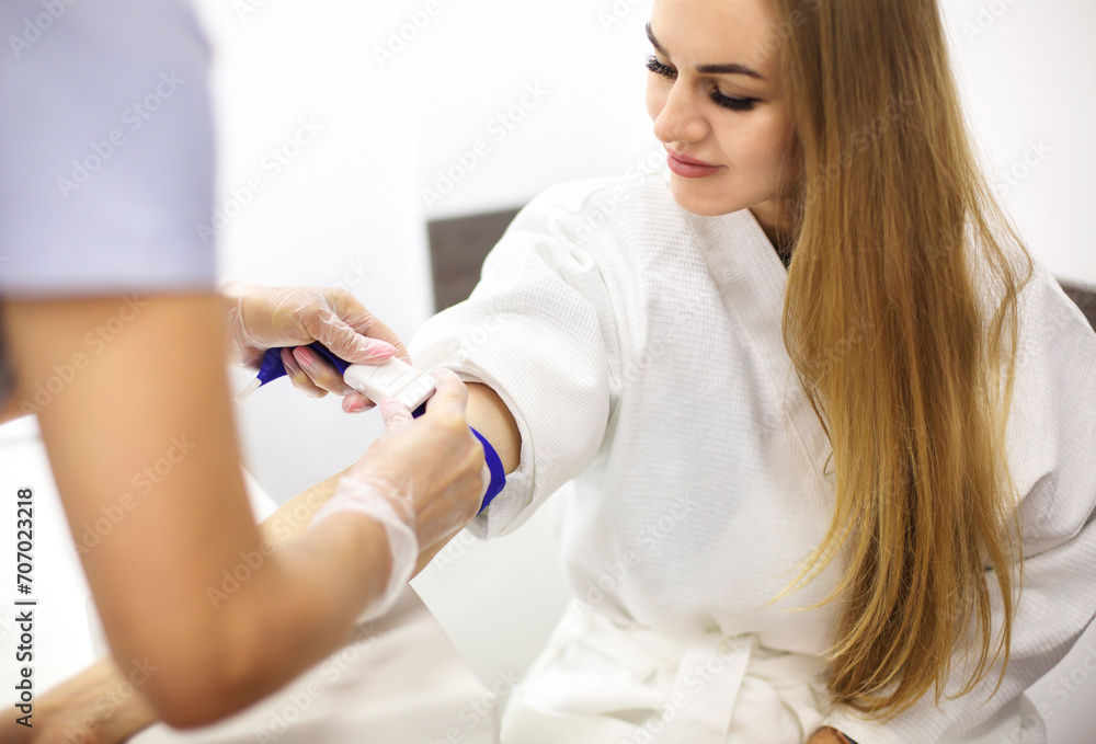 Young patient during blood test sampling procedure Young patient during blood test sampling procedure