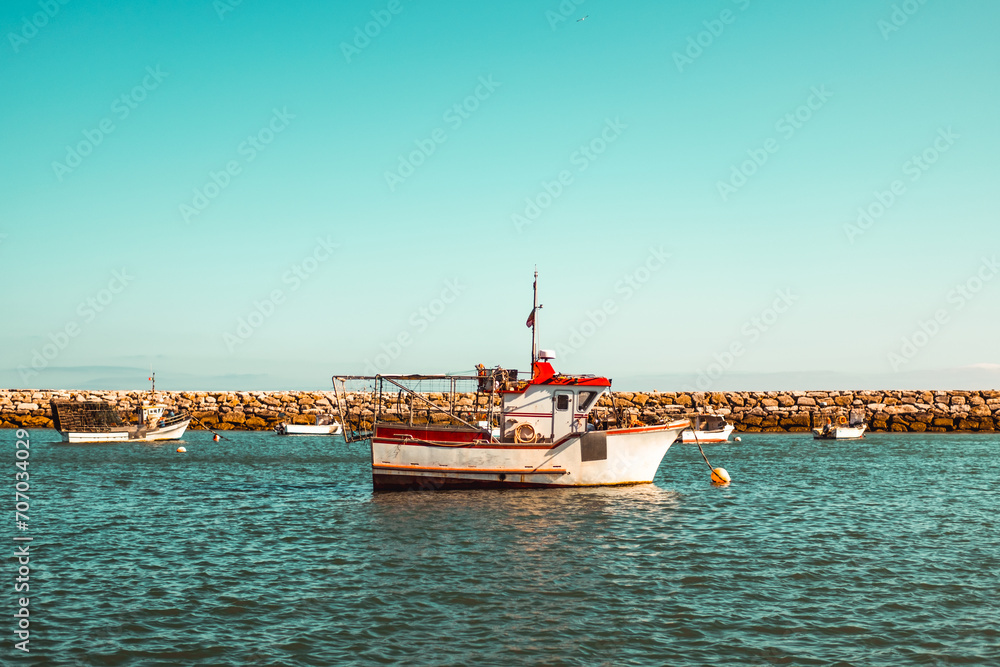 Small boat in marina of Albufeira, Algarve, Portugal