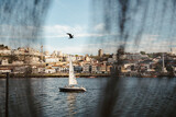 Beautiful view of Porto and Vila Nova da Gaia with sailing boat at Douro river, Portugal