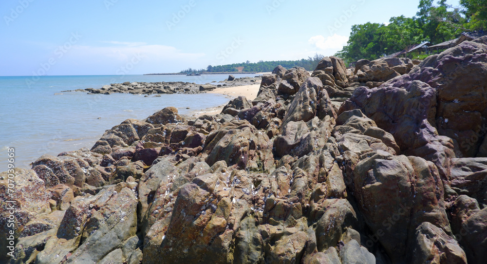 The Natural Phenomenon Of Large Rocks That Pile Up Naturally On The Edge Of The Tropical Coast Of Tanjung Kalian, Indonesia The Natural Phenomenon Of Large Rocks That Pile Up Naturally On The Edge Of The Tropical Coast Of Tanjung Kalian, Indonesia