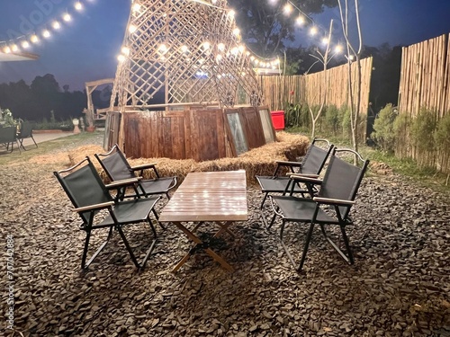 camping chair , campstool and table outdoor place for holiday weekend. photo