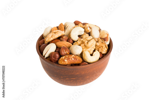 Roasted mix nut in bowl isolated on white background. mix nut is snack or raw of cook. Healthy food concept
