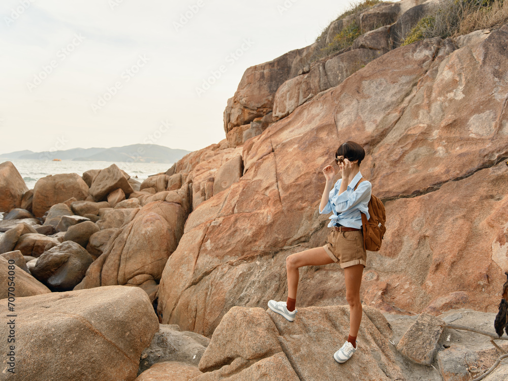 Relaxing Sunset Serenity: One Standing Female, Enjoying Freedom and Nature on Beautiful Seashore Relaxing Sunset Serenity: One Standing Female, Enjoying Freedom and Nature on Beautiful Seashore