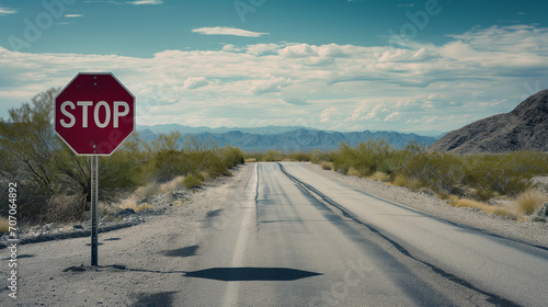 stop sign by a deserted road