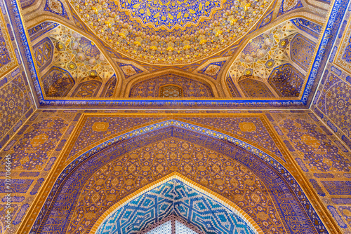 Interior of Tilya Kori Madrasah in Registan. Masterpiece of XVII century. Golden and blue ornaments. April 24, 2023. Samarkand, Uzbekistan