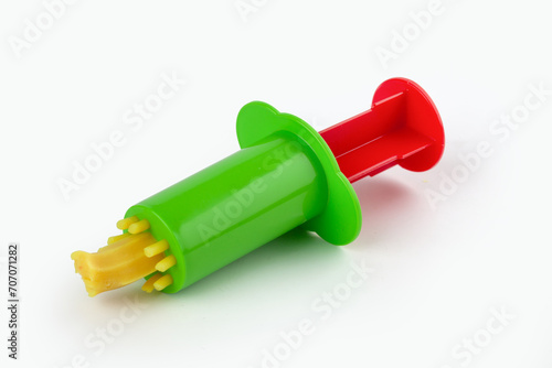 Toy syringe press for playdough