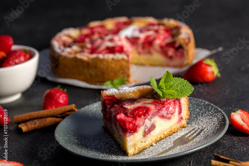 Strawberry cake. Menu concept. Homemade strawberry cake decorated with strawberries and mint leaves.