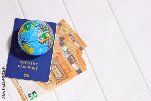 Travel concept, passport, globe earth and money on white background