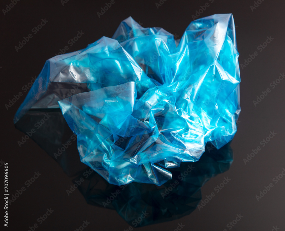 Blue polyethylene on a black background Blue polyethylene on a black background