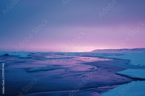 The tranquil arctic landscape glistened under the vibrant sunset  as the frozen lake s icy surface reflected the cold winter sky