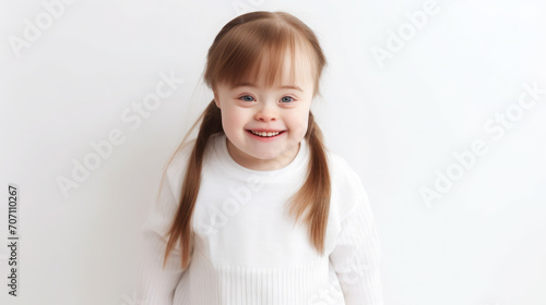 little cute girl with down syndrome in casual clothes on a white background, smiling child, person with special needs, kid, toddler, childhood, chromosomal disease, disability, studio portrait