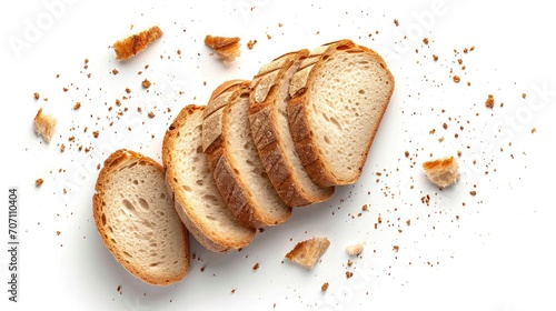Sliced bread isolated on a white background. Bread slices and crumbs viewed from above. Top view photo