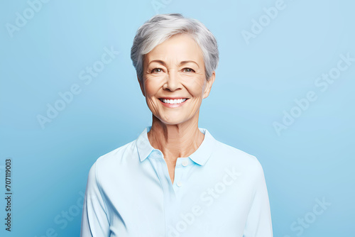 Happy senior woman is smiling on clean background. Generative ai design art.