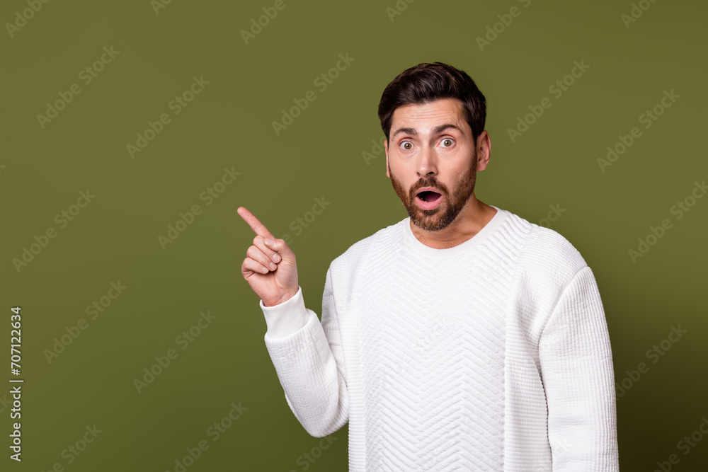 Photo of crazy shocked man open mouth dressed stylish clothes impressed low price benefit empty space isolated on khaki color background Photo of crazy shocked man open mouth dressed stylish clothes impressed low price benefit empty space isolated on khaki color background
