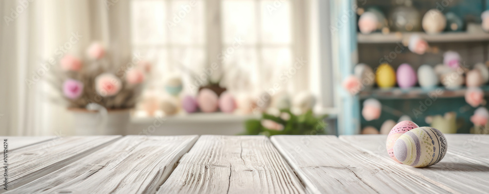 White wooden table with a bouquet of flowers in a vase, eggs and a beautiful Easter background - obrazy, fototapety, plakaty 