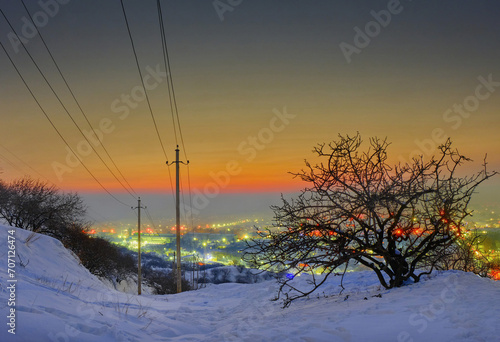 Landscape of a night city in winter captured from a high point