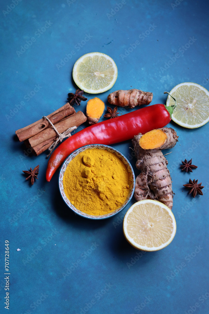 Detox cocktail ingredients on a table. Top view photo of lemon, ginger and turmeric. Alternative medicine concept. Detox cocktail ingredients on a table. Top view photo of lemon, ginger and turmeric. Alternative medicine concept.