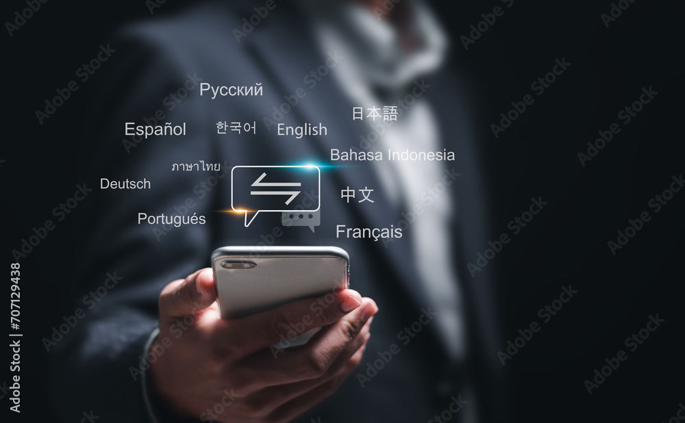 Translator app and languages education concept. Person use mobile smartphone with with translator app to translation of foreign languages. language course and e-learning. - obrazy, fototapety, plakaty 