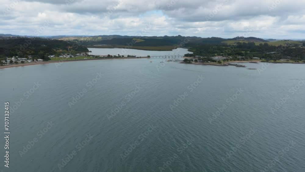 Aerial: Harbour coastline alongside Waitangi, Northland, New Zealand. Aerial: Harbour coastline alongside Waitangi, Northland, New Zealand.