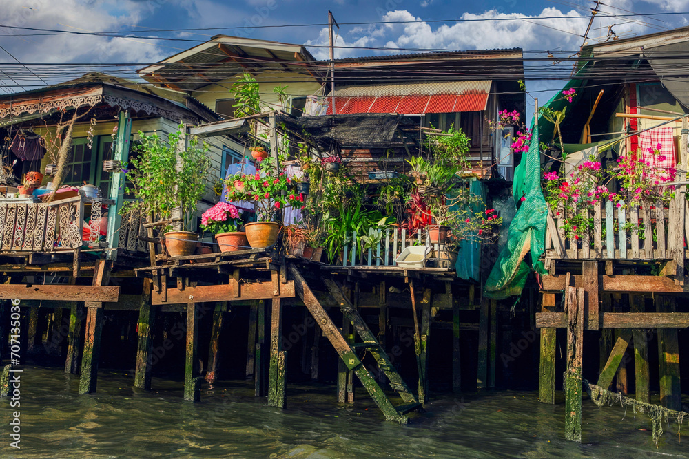 Vibrant Southeast Asian Stilt Houses, Rustic Wooden Architecture Over Water, Coastal Community Life