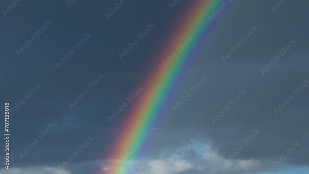 Going up with a rainbow light over the clouds Going up with a rainbow light over the clouds