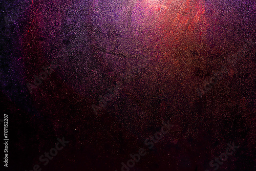 Black dark red blue pink orange golden shiny glitter abstract background with space. Twinkling glow stars effect. Like outer space, night sky, universe. Rusty, rough surface, grain.