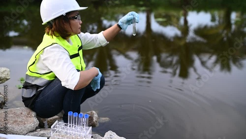 Environmental engineers inspect water quality,Bring water to the lab for testing,Check the mineral content in water and soil,Check for contaminants in water sources. photo