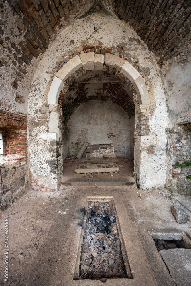 Abandoned Ruins of ancient Monastery of Saint Marry of the Angels Place of Missing main Altair and Profaned Empty Tombs Indoors - Osor , Cres Island Croatia
