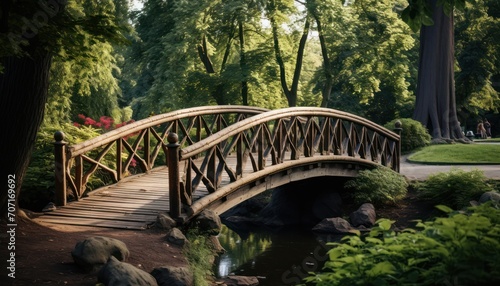 Wooden Bridge Over Small Pond in Park © Anna
