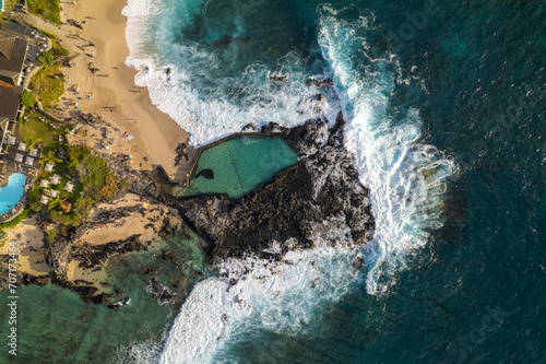 Aerial drone view of Boucan Canot beach and natural swimming pool in Saint-Gilles-les-Bains in the town of Saint-Paul photo