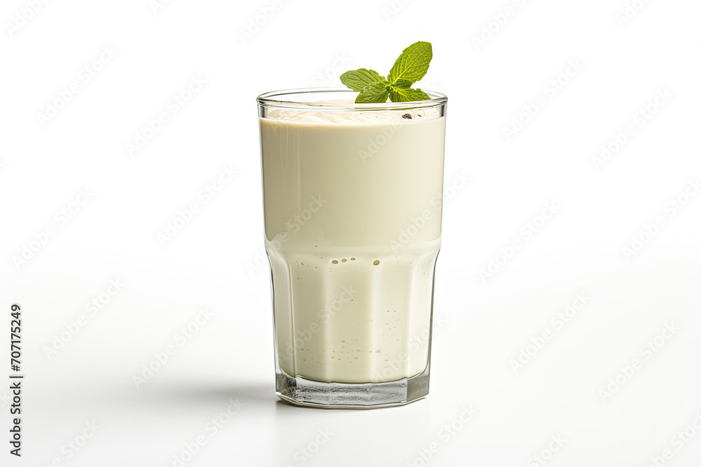 Refreshing Glass of Milk With Fresh Green Leaf Refreshing Glass of Milk With Fresh Green Leaf