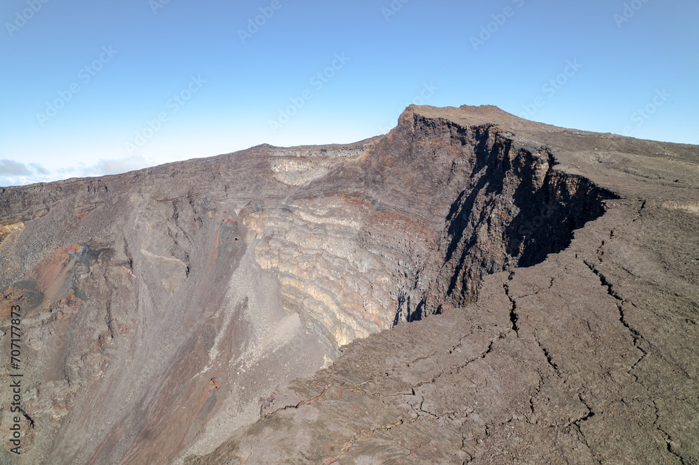 Aerial view by drone of the Piton de la Fournaise, the Dolomieu crater, the Formica Léo volcanic cone and the Chapelle de Rosemont in the Fouqué enclosure, Reunion Island