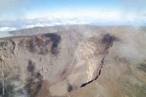 Aerial view by drone of the Piton de la Fournaise, the Dolomieu crater, the Formica Léo volcanic cone and the Chapelle de Rosemont in the Fouqué enclosure, Reunion Island photo