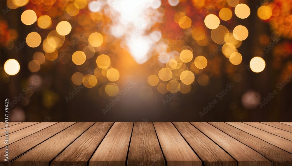  The empty wooden table top with blur background of autumn. Exuberant image for display 