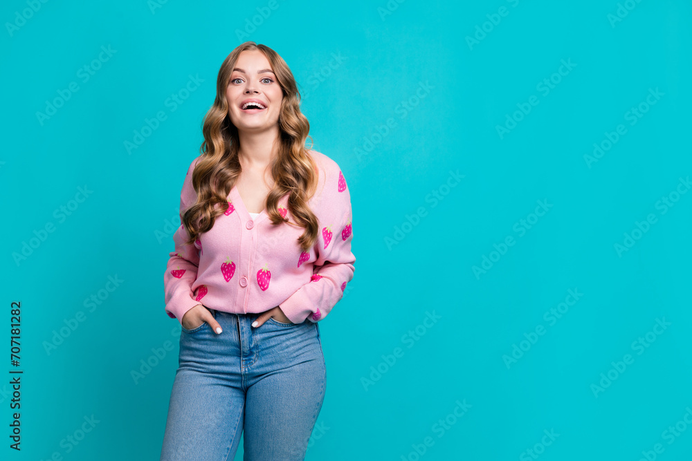 Portrait photo of laughing in good mood funky positive young lady candid model near copyspace carefree isolated on blue color background Portrait photo of laughing in good mood funky positive young lady candid model near copyspace carefree isolated on blue color background