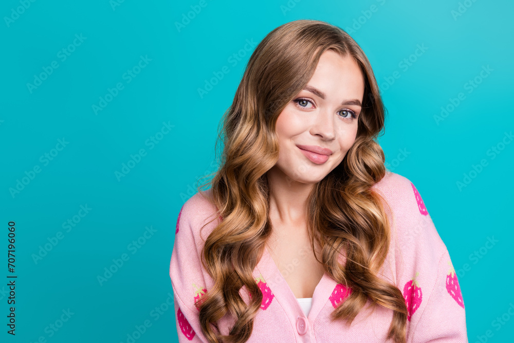 Photo portrait of young stunning sweet gorgeous lady in pink pullover with strawberry print posing cute isolated on blue color background Photo portrait of young stunning sweet gorgeous lady in pink pullover with strawberry print posing cute isolated on blue color background