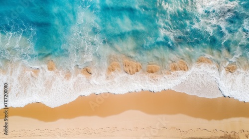 Aerial view of drone, top view beach and seawater on sandy beach in summer. Nature and travel concept.