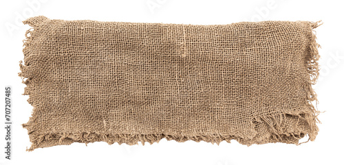 Burlap texture. A piece of torn burlap on a white background. Canvas. Packing material photo