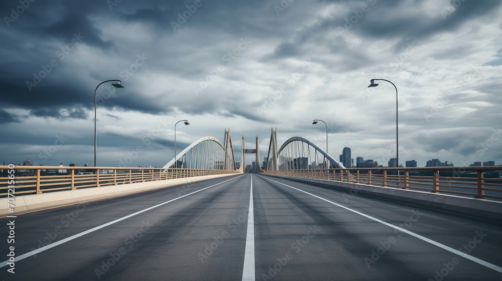 street on a deserted city bridge with clouds
